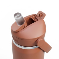 Lid of a rust red drink bottle with a open flip straw