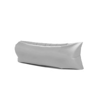 An inflatable lazy bed in a sleek grey colour, featuring a smooth, elongated design. It has a logo on one side.