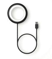 A black circular lamp with a USB cable attached, featuring a sleek and minimalist design.