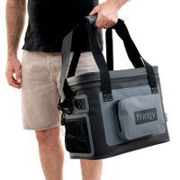 Man holding a Fridgy insulated cooler bag.