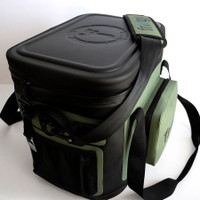 Durable black and green cooler bag with shoulder strap for outdoor activities.