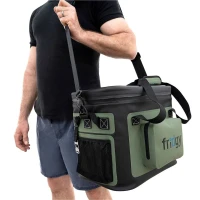Portable black and olive green Fridgy cooler bag with adjustable shoulder strap, front storage pocket, and mesh side pocket being carried by hand.