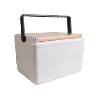 A cooler box in white with a wooden lid and a black handle. It features a simple, modern design.