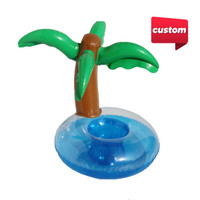 An inflatable cup holder shaped like a palm tree, featuring green leaves and a blue base. It includes a logo.