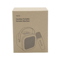 A box for a Caroline Portable Karaoke Machine featuring a square speaker design and a microphone, in a brown cardboard finish.