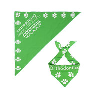 A green triangle pet bandana featuring white paw print patterns and a logo.