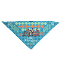 A triangle pet bandana in teal and orange with a diamond pattern and cartoon characters celebrating Thanksgiving.
