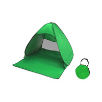 A green pop-up beach tent with a matching carry bag, designed for outdoor sunshade use.