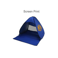 A blue pop-up beach tent with a screen-printed logo, featuring a spacious interior and a simple design.