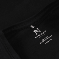 Detail of print inside black women's t-shirt with the Nimbus Nordic logo