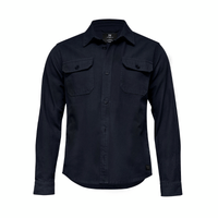 A navy unisex shirt with long sleeves, button-up front, and two chest pockets. Features a logo.