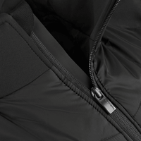 Detailled image of a zipper on a black vest