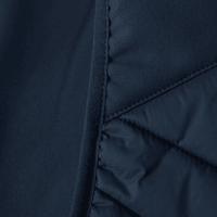 Detailled photo of the pocket seam of a navy vest