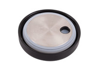 A black vacuum food pod lid with a stainless steel top and a circular shape. It features a small opening.