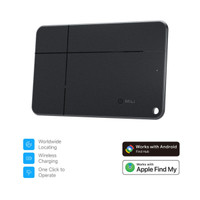 A black wireless tracking tag with a textured surface, featuring a small branding logo and a circular attachment hole.