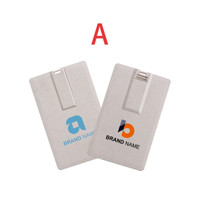 A wheat straw credit card flash drive in light beige, featuring promotional branding on both sides.
