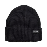 Waffle beanie in the colour black with a small black pip label attached on the fold over