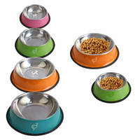 A set of pet feeding bowls in orange, green, pink, and teal, featuring stainless steel interiors and rubber bases.