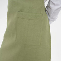 A green apron with a simple design featuring two front pockets and a neck strap. It has a small logo.