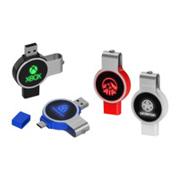 A collection of silver and coloured flash drives with swivel designs and logos, featuring USB connectors on both ends.