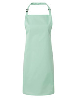 A mint green bib apron with a halter neck design and an adjustable strap, featuring a logo.