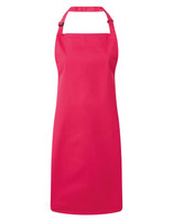 A pink bib apron with an adjustable neck strap and a plain design, featuring a branding logo.