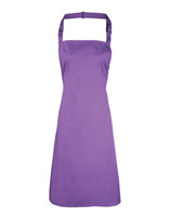 A purple bib apron featuring a halter neck design and a logo on the front.