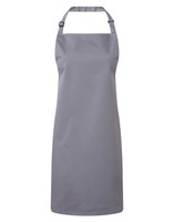 A grey bib apron with a neck strap and adjustable fastening, featuring a logo. Suitable for chefwear uniforms.