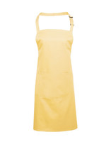A yellow bib apron with a pocket and an adjustable neck strap, featuring a small logo.