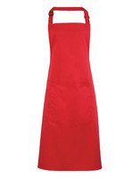 A red bib apron with a pocket and adjustable neck strap, featuring a branding logo. Ideal for workwear use.