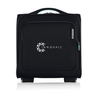 A black wheeled bag with a front pocket and a logo, designed for travel convenience.
