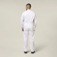 Back view of a male model wearing a white work jumpsuit and black work boots against a neutral background.