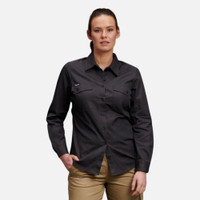 Woman wearing charcoal long-sleeve utility shirt and blue jeans.