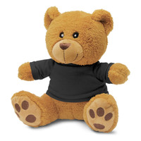 A plush teddy bear toy in a brown hue, wearing a black T-shirt, with soft paws and a friendly expression.
