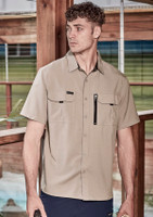 A light beige men's short sleeve button-up shirt with two chest pockets and a zipper pocket, featuring a logo.