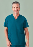 A unisex pulse v-neck scrub top in teal, featuring a pocket and a logo. The model is smiling.