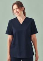 A women's navy V-neck scrub top featuring short sleeves and two front pockets. It has a subtle logo.