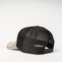 A trucker cap featuring a grey front panel and black mesh back, with an adjustable snap closure.