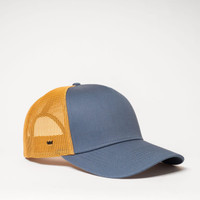 A trucker cap in navy blue and orange, featuring a mesh back and a logo on the side.