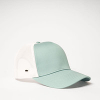 A light green 5-panel trucker cap with a white mesh back and a small logo.