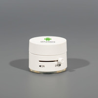 A white suction phone stand with an adjustable switch and an Android logo on top, set against a grey background.