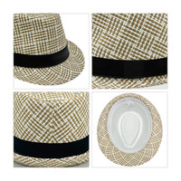 A breathable woven straw hat in tan and white with a black band, featuring a textured pattern and a smooth interior.