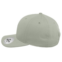 A green six-panel cap featuring a curved brim and a branded tag on the side.