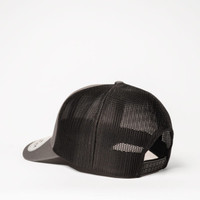 A black mesh trucker cap featuring a six-panel design and a branded logo on the front.