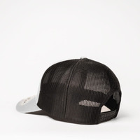 A grey and black UFlex Classic Ultra-lite 6 Panel Trucker Cap with a mesh back and an adjustable strap.
