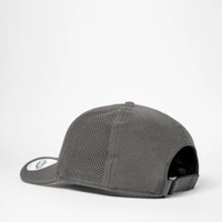Black perforated baseball cap with adjustable strap, side view.