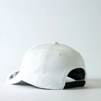 White mesh baseball cap with adjustable black strap, minimalist design.