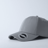 A grey recycled polyester cap with a textured surface and a branded logo on the side.