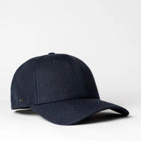 A navy blue six-panel snapback cap featuring a logo on the front. The cap has a structured design.