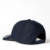 A navy blue 6-panel snapback cap featuring a logo on the side. The back has an adjustable snap closure.